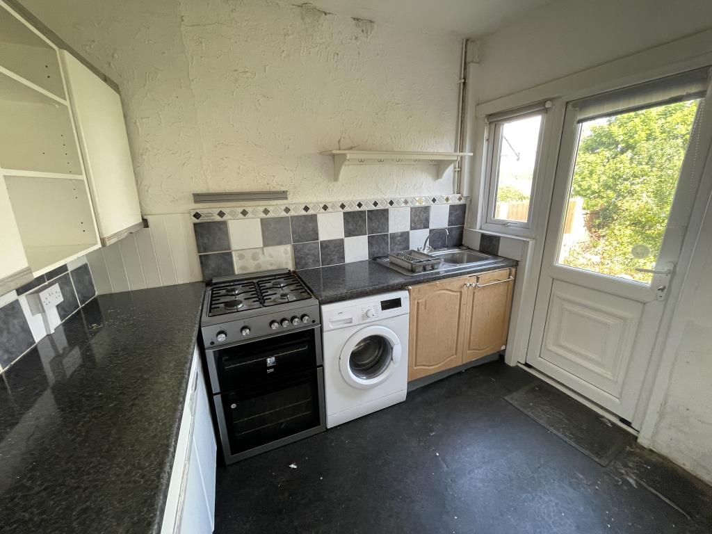 Lot: 103 - THREE-BEDROOM SEMI-DETACHED HOUSE FOR IMPROVEMENT - inside image of kitchen